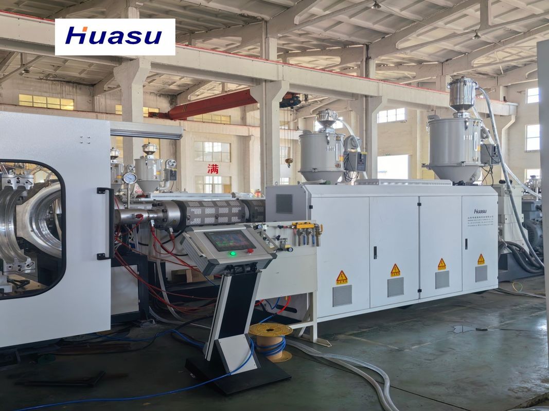 이중 벽 류류 파이프 추출 라인 32-1600mm 절단 지름 범위와 시멘스 PLC 기술을 특징으로 하는 물 냉각 과정